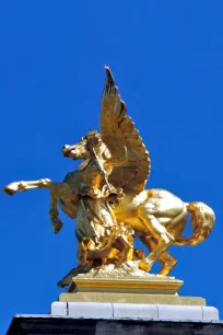 Gilded statue of the Arts on the Pont Alexandre III in Paris